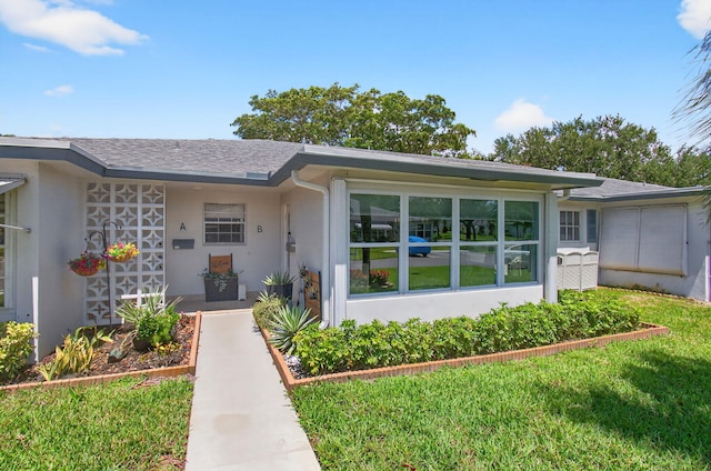 1170 S Drive Cir Unit B, Delray Beach, FL 33445 - entrance to property with stucco siding and roof with shingles