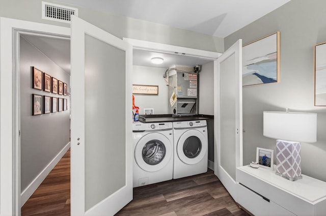 1170 S Drive Cir Unit B, Delray Beach, FL 33445 - laundry room with separate washer and dryer and wood finished floors