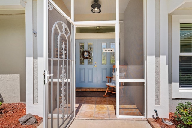 1200 SW Arrowhead Ct, Palm City, FL 34990 - property entrance with stucco siding and covered porch
