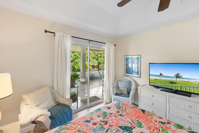 1200 SW Arrowhead Ct, Palm City, FL 34990 - tiled bedroom with access to exterior and a ceiling fan