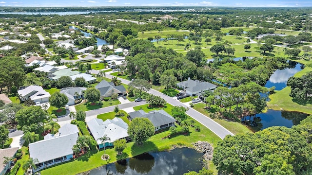 1200 SW Arrowhead Ct, Palm City, FL 34990 - aerial perspective of suburban area with a large body of water