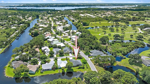 1200 SW Arrowhead Ct, Palm City, FL 34990 - aerial view of property's location with nearby suburban area and a nearby body of water