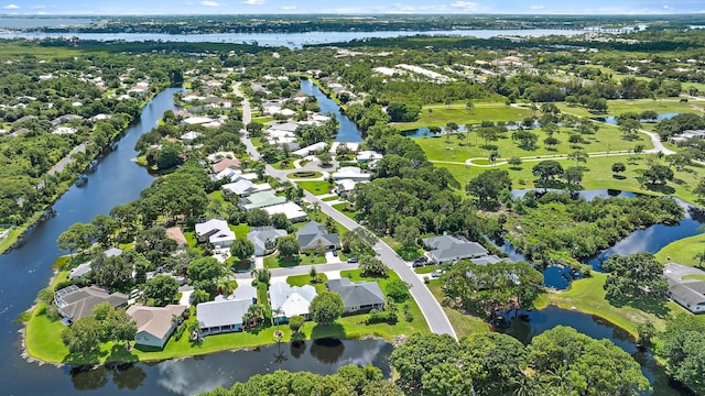 1200 SW Arrowhead Ct, Palm City, FL 34990 - aerial view of property's location with nearby suburban area and a large body of water