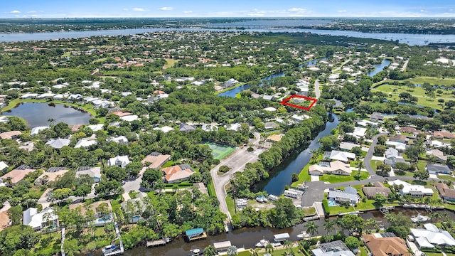 1200 SW Arrowhead Ct, Palm City, FL 34990 - aerial view of property and surrounding area with nearby suburban area