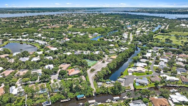 1200 SW Arrowhead Ct, Palm City, FL 34990 - aerial view of property and surrounding area featuring nearby suburban area