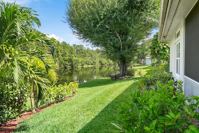 1200 SW Arrowhead Ct, Palm City, FL 34990 - view of grassy yard featuring a water view