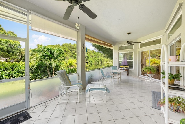 1200 SW Arrowhead Ct, Palm City, FL 34990 - unfurnished sunroom featuring a ceiling fan and healthy amount of natural light