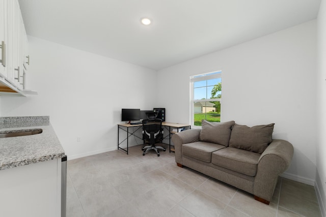1312 SW Calmar Ave Unit 164, Port Saint Lucie, FL 34953 - office area with light tile patterned floors and baseboards