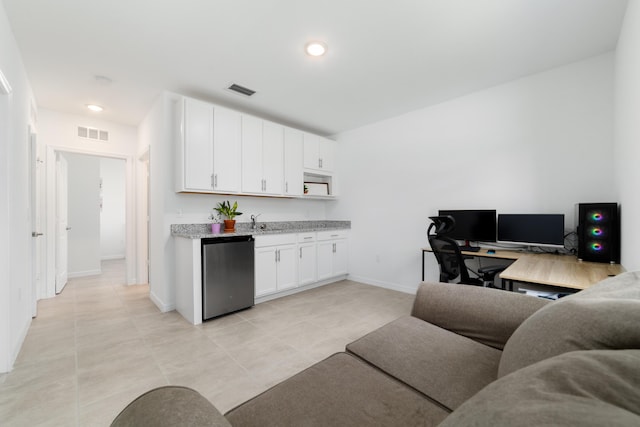 1312 SW Calmar Ave Unit 164, Port Saint Lucie, FL 34953 - living room featuring light tile patterned floors, bar with sink, and recessed lighting