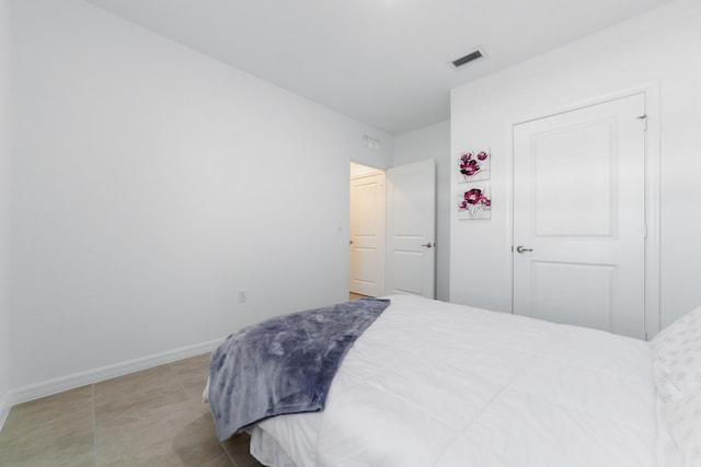1312 SW Calmar Ave Unit 164, Port Saint Lucie, FL 34953 - bedroom featuring baseboards