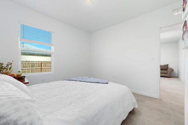 1312 SW Calmar Ave Unit 164, Port Saint Lucie, FL 34953 - bedroom with baseboards