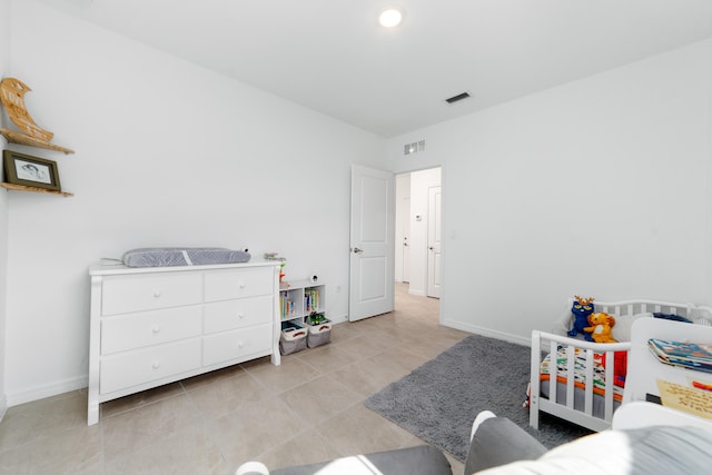 1312 SW Calmar Ave Unit 164, Port Saint Lucie, FL 34953 - bedroom featuring light tile patterned flooring and baseboards