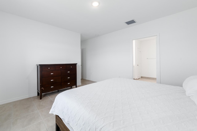 1312 SW Calmar Ave Unit 164, Port Saint Lucie, FL 34953 - bedroom with light tile patterned flooring and baseboards
