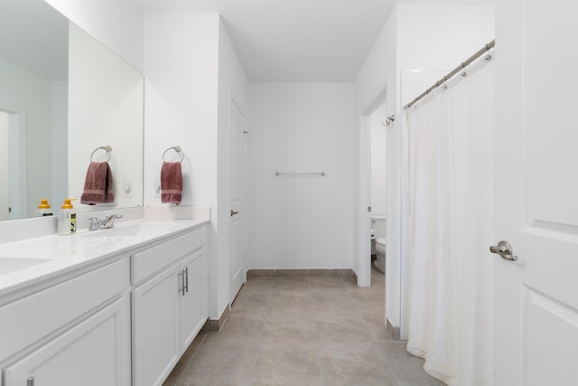 1312 SW Calmar Ave Unit 164, Port Saint Lucie, FL 34953 - bathroom with double vanity and toilet