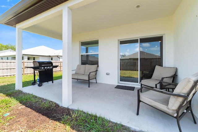 1312 SW Calmar Ave Unit 164, Port Saint Lucie, FL 34953 - view of patio / terrace featuring a grill
