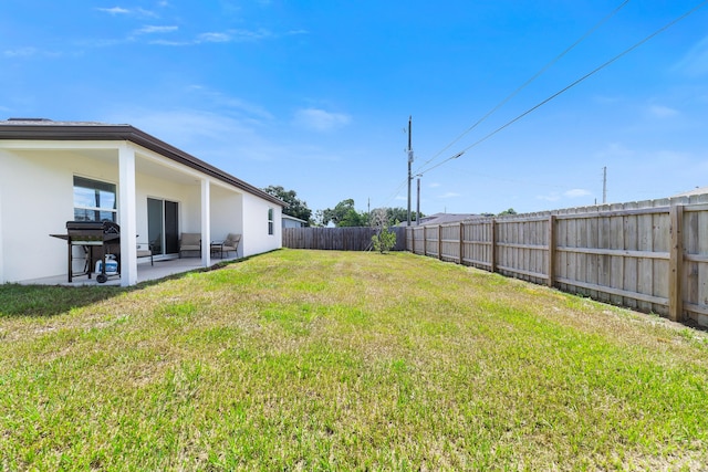 1312 SW Calmar Ave Unit 164, Port Saint Lucie, FL 34953 - fenced backyard featuring a patio area