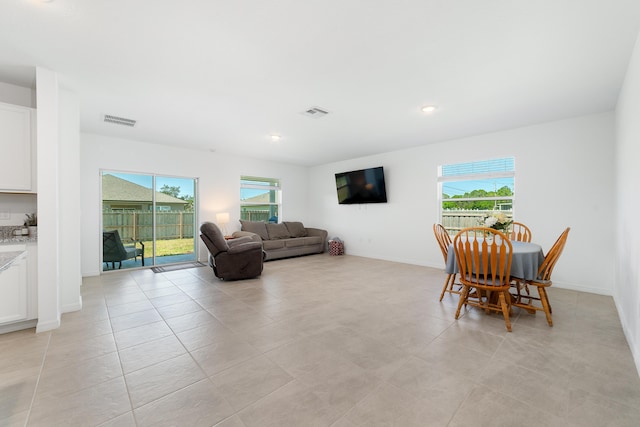 1312 SW Calmar Ave Unit 164, Port Saint Lucie, FL 34953 - living area with recessed lighting and light tile patterned floors