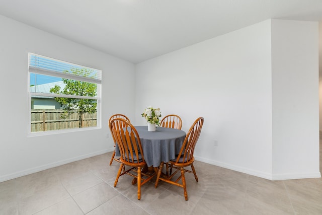 1312 SW Calmar Ave Unit 164, Port Saint Lucie, FL 34953 - dining room featuring baseboards and tile patterned flooring