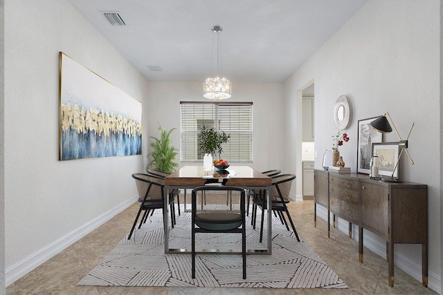 8183 Emerald Winds Cir, Boynton Beach, FL 33473 - dining room featuring a chandelier and light tile patterned flooring