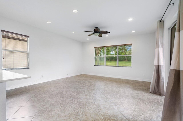 8183 Emerald Winds Cir, Boynton Beach, FL 33473 - empty room featuring recessed lighting, a ceiling fan, and light tile patterned floors