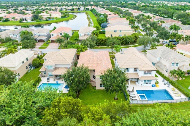 8183 Emerald Winds Cir, Boynton Beach, FL 33473 - aerial perspective of suburban area featuring a pool and a nearby body of water