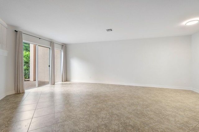 8183 Emerald Winds Cir, Boynton Beach, FL 33473 - spare room with baseboards