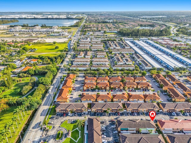 7853 W 36th Ave Unit 104, Hialeah, FL 33018 - aerial overview of property's location featuring a nearby body of water and nearby suburban area