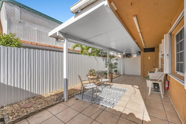 7853 W 36th Ave Unit 104, Hialeah, FL 33018 - fenced backyard featuring a patio area