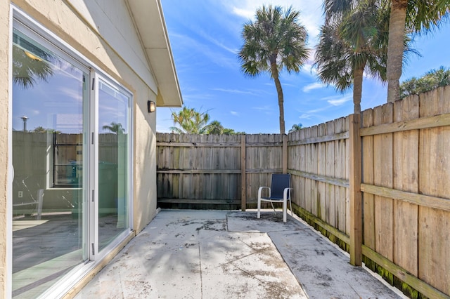 193 SE 1st Cir Unit 6B, Boynton Beach, FL 33435 - fenced backyard featuring a patio area