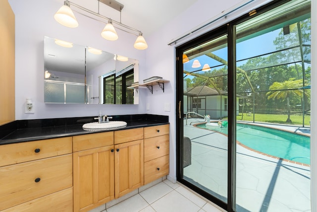 16888 W Stallion Dr, Loxahatchee, FL 33470 - full bathroom with vanity, tile patterned floors, and a shower with door