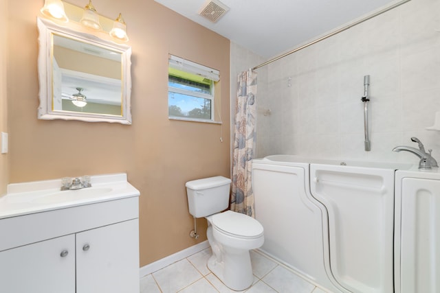 16888 W Stallion Dr, Loxahatchee, FL 33470 - bathroom featuring vanity, tile patterned floors, and shower / tub combo