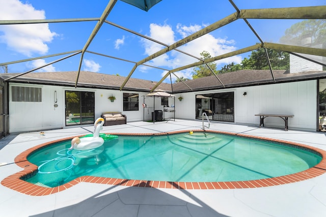 16888 W Stallion Dr, Loxahatchee, FL 33470 - outdoor pool featuring a patio and a lanai
