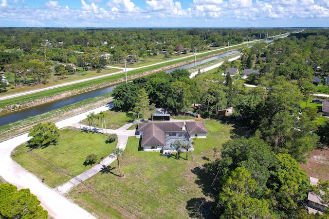 16888 W Stallion Dr, Loxahatchee, FL 33470 - drone / aerial view of a nearby body of water and a tree filled landscape