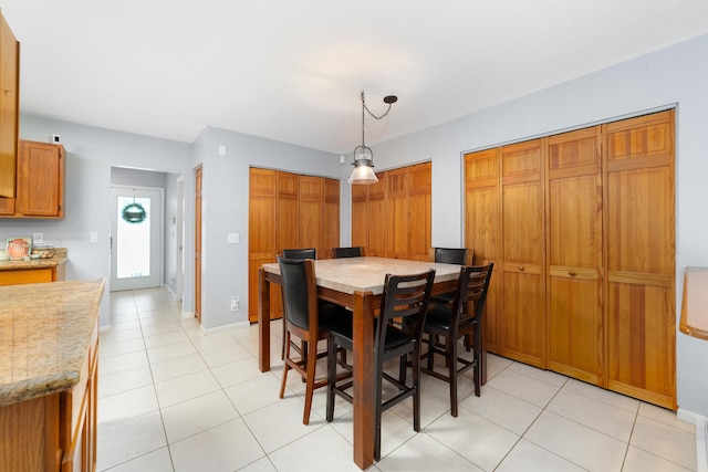 16888 W Stallion Dr, Loxahatchee, FL 33470 - dining area featuring light tile patterned floors and baseboards