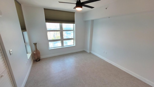 450 N Federal Hwy Unit 1101, Boynton Beach, FL 33435 - spare room featuring a ceiling fan and light tile patterned floors