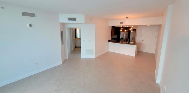 450 N Federal Hwy Unit 1101, Boynton Beach, FL 33435 - unfurnished living room with a sink and a chandelier
