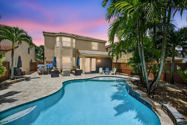 9196 Dupont Pl, Wellington, FL 33414 - view of swimming pool featuring a patio and a fenced backyard