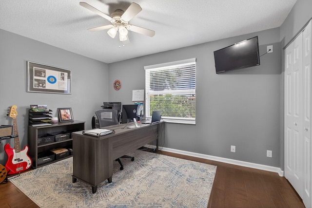 9196 Dupont Pl, Wellington, FL 33414 - office space featuring wood finished floors, ceiling fan, and a textured ceiling