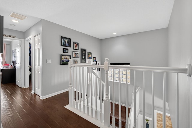 9196 Dupont Pl, Wellington, FL 33414 - corridor featuring an upstairs landing, wood finished floors, and recessed lighting