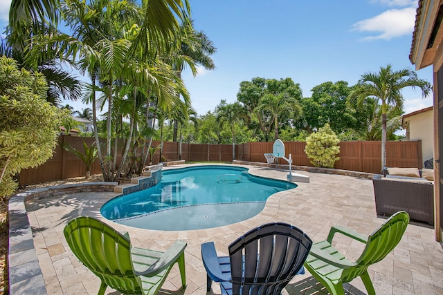 9196 Dupont Pl, Wellington, FL 33414 - view of swimming pool featuring a fenced backyard and a patio