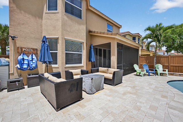 9196 Dupont Pl, Wellington, FL 33414 - view of patio with a sunroom and an outdoor hangout area