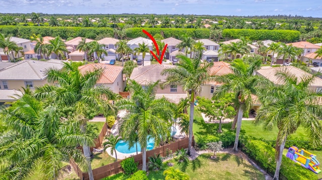 9196 Dupont Pl, Wellington, FL 33414 - aerial view of property and surrounding area with nearby suburban area and a pool