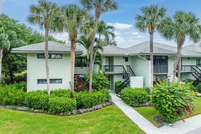 3843 Quail Ridge Drive Mallard, Boynton Beach, FL 33436 - view of building exterior featuring stairway