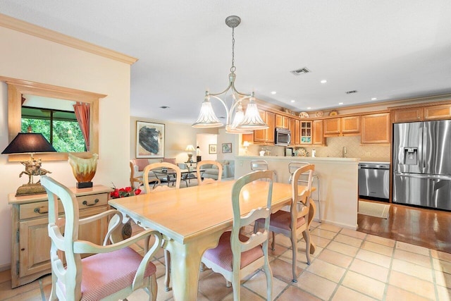 3843 Quail Ridge Drive Mallard, Boynton Beach, FL 33436 - dining space with light tile patterned flooring, ornamental molding, and recessed lighting