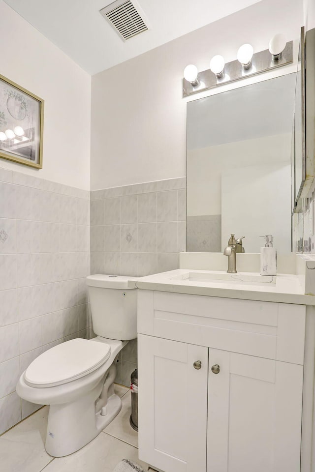 3385 Seabreeze Ln, Margate, FL 33063 - bathroom with vanity, tile walls, and wainscoting