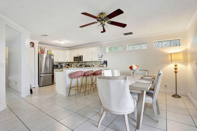 3385 Seabreeze Ln, Margate, FL 33063 - dining space featuring ornamental molding, ceiling fan, and light tile patterned flooring