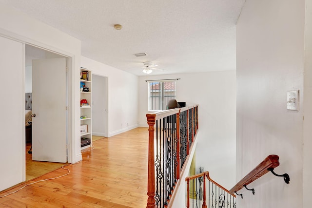 3385 Seabreeze Ln, Margate, FL 33063 - corridor featuring an upstairs landing and light wood-style floors