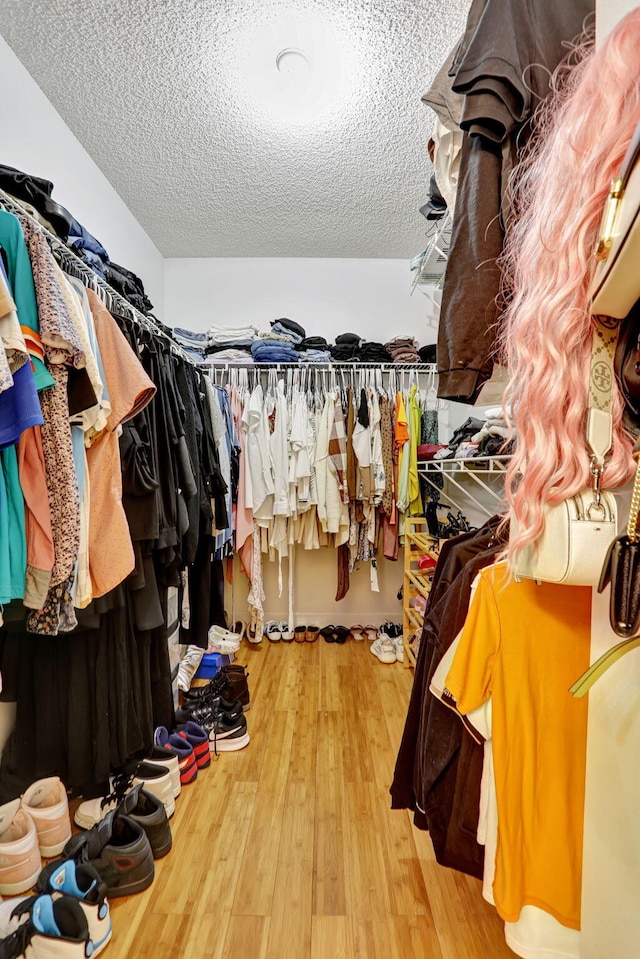 3385 Seabreeze Ln, Margate, FL 33063 - walk in closet featuring wood finished floors