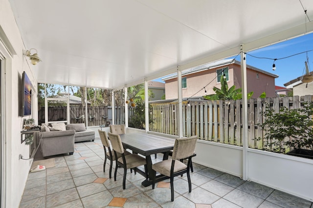 3385 Seabreeze Ln, Margate, FL 33063 - sunroom with outdoor dining area, plenty of natural light, and outdoor lounge area