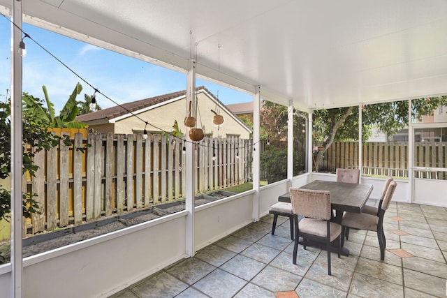 3385 Seabreeze Ln, Margate, FL 33063 - sunroom / solarium with outdoor dining space